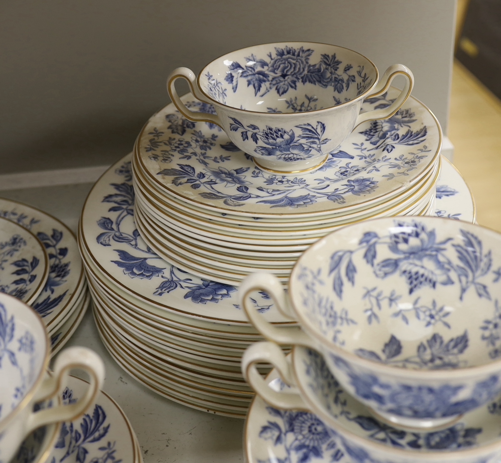 A Wedgwood bone china blue and white dinner service including oval platters, sauce boats and a tureen